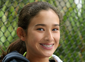 young girl with braces