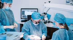 an oral surgeon performing dental implant placement