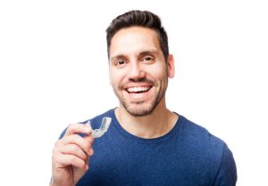 Invisalign clear aligners from Canton dentist, Dr. J. D. Robison, correct crooked smiles invisibly and quickly with comfort. Learn treatment details here.