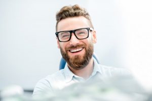 man smiling with perfect teeth