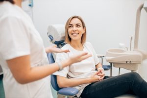 woman talking to dentist in Canton