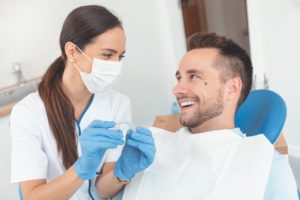 Invisalign provider in Canton showing a patient how Invisalign works   