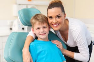 mother and child visit dentist in Canton