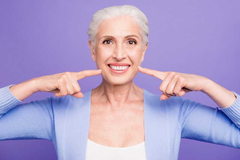 woman smiling with dental implants in Canton