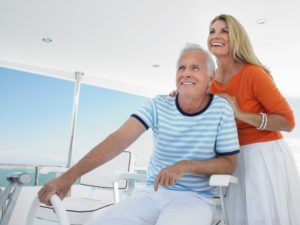 smiling couple on boat
