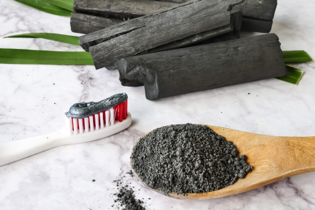 spoonful of charcoal and charcoal toothpaste