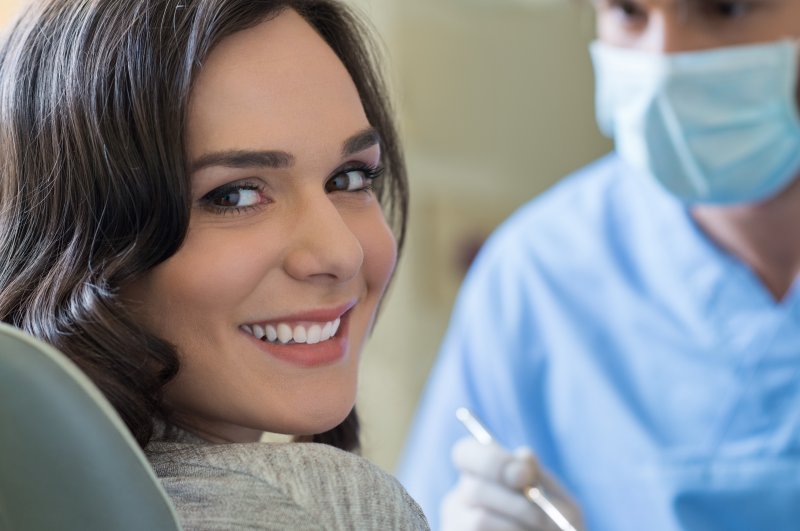 A dentist in Canton giving his patient a smile makeover